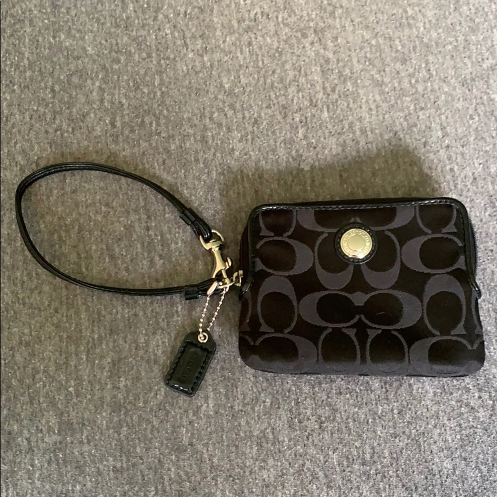 Coach | black lettered wristlet - never used